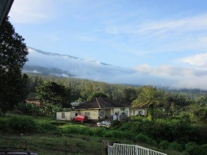 (Standing on the porch at Hostetter's watching the fog creeping up Mt. Cameroon)