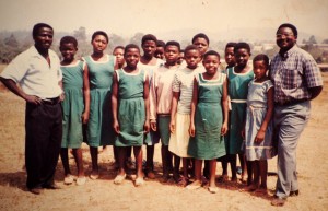 Divine (at right) as a primary schoolteacher